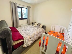 Bedroom One- click for photo gallery